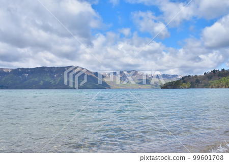 Aomori Lake Towada with blue sky and fresh greenery 99601708