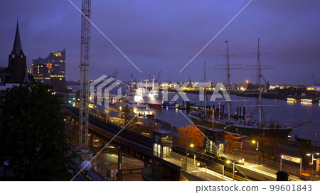 Famous St Pauli Landungsbruecken at the port of Hamburg - amazing evening view Famous St Pauli Landungsbruecken at the port of Hamburg - amazing evening view 99601843