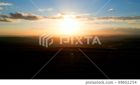 Beautiful sunset on a blue sky - Peak District National Park - travel photography Beautiful sunset on a blue sky - Peak District National Park - travel photography 99602254