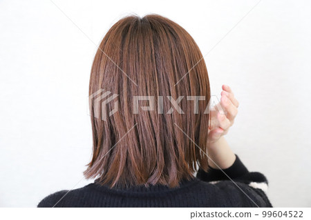 Woman's back hair Woman's back hair 99604522