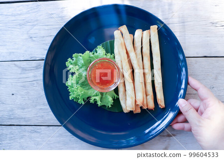 spring rolls , snack or roll stick or fried rolls spring rolls , snack or roll stick or fried rolls 99604533