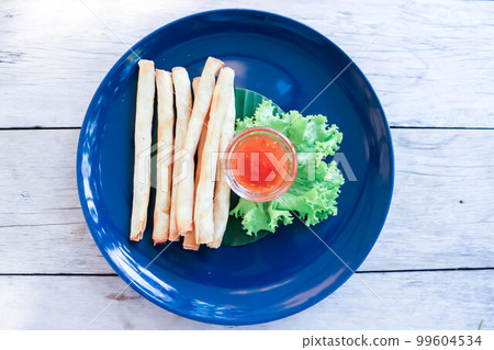 spring rolls , snack or roll stick or fried rolls spring rolls , snack or roll stick or fried rolls 99604534