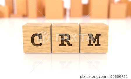 A wooden block with the letters CRM printed on it 99606751