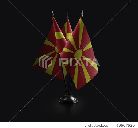 Small national flags of the Macedonia on a black background 99607629