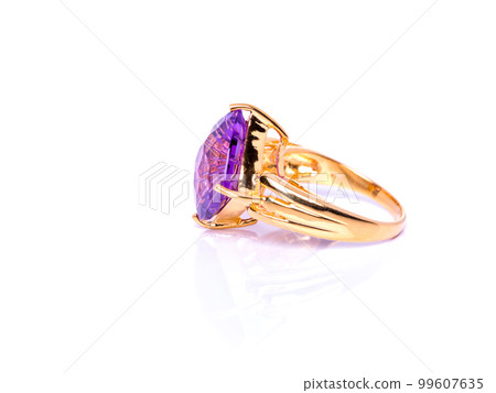 Amethyst Jewel or gems ring on white background with reflection. Collection of natural gemstones accessories. Studio shot Amethyst Jewel or gems ring on white background with reflection. Collection of natural gemstones accessories. Studio shot 99607635