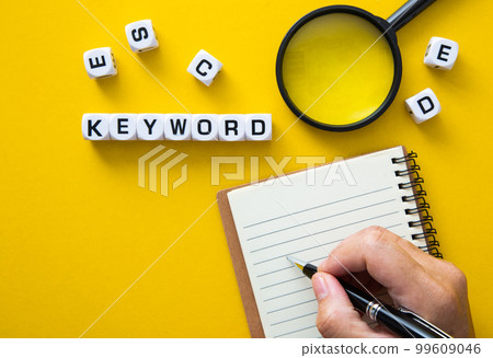 Block of Keyword on yellow background. Conceptual image of the importance of the keywords. 99609046
