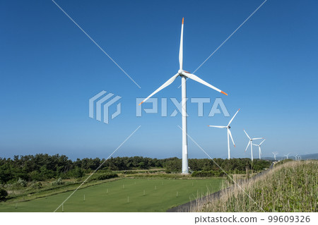 A wind power generator shining in the blue sky (Hokuei Town, Tottori Prefecture) 99609326