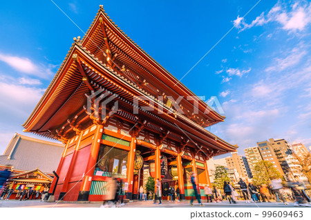 Tokyo cityscape in Japan Senso-ji Temple bathed in the setting sun. Bustling with many foreign tourists, just like before the corona crisis 99609463