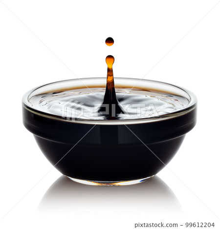 soy sauce with spalsh and drop in glass bowl isolated on white background soy sauce with spalsh and drop in glass bowl isolated on white background 99612204