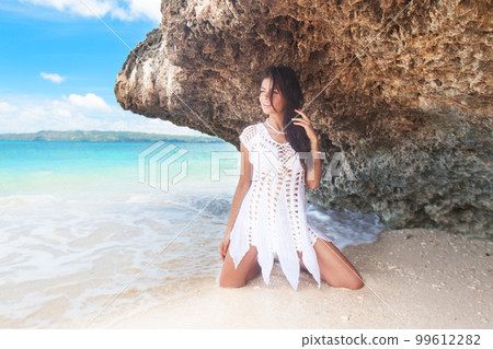 Boho woman on beach Boho woman on beach 99612282