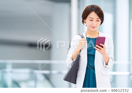 Business businessman office woman office casual commuting going to work middle Business businessman office woman office casual commuting going to work middle 99612552
