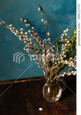 flowering willow in a glass decanter 99612745