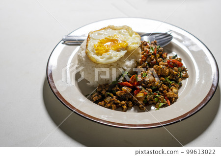stir-fried basil with pork and fried egg stir-fried basil with pork and fried egg 99613022