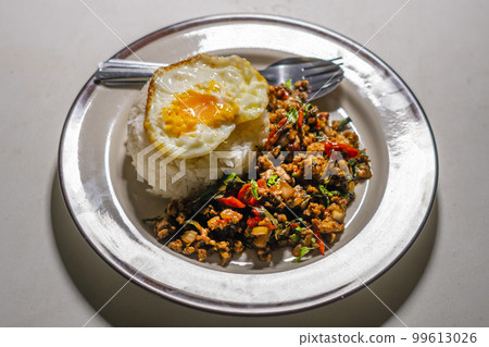 stir-fried basil with pork and fried egg stir-fried basil with pork and fried egg 99613026