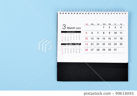 A March 2023 Monthly desk calendar for 2023 year on blue colour background. 99618093
