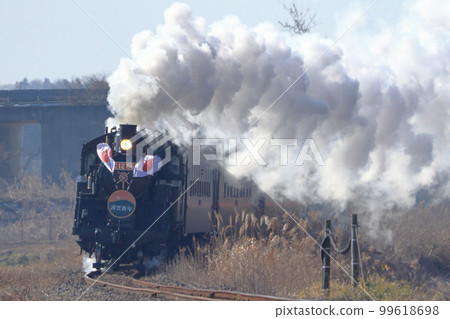 Moka Railway Steam locomotive C1266 SL Moka running with a Happy New Year head mark and the Rising Sun flag Moka Railway Steam locomotive C1266 SL Moka running with a Happy New Year head mark and the Rising Sun flag 99618698