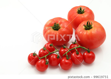 Large tomato with white back and mini tomato with cob 99619731