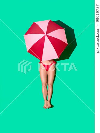 Summer beach concept, woman sunbathing, top view on a green background Summer beach concept, woman sunbathing, top view on a green background 99619787