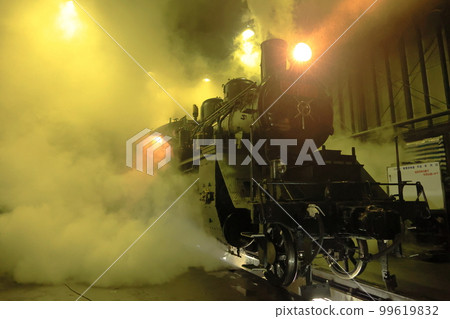 Moka Railway Steam locomotive C1266 nestled in the Moka locomotive warehouse at night Night photo session Moka Railway Steam locomotive C1266 nestled in the Moka locomotive warehouse at night Night photo session 99619832