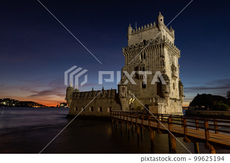 View at the Belem tower at the bank of Tejo River in Lisbon - Night Time View at the Belem tower at the bank of Tejo River in Lisbon - Night Time 99625194