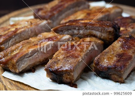 delicious ribs with sauce 99625609