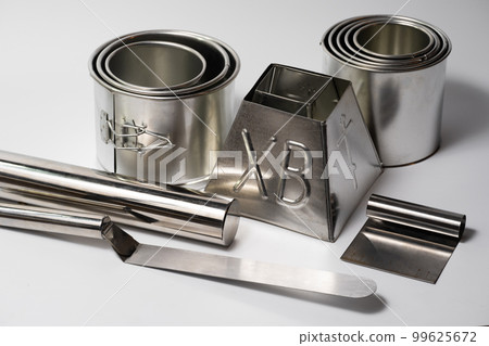 metal round forms for baking Easter for Easter in Ukraine, isolated on a white background. metal round forms for baking Easter for Easter in Ukraine, isolated on a white background. 99625672