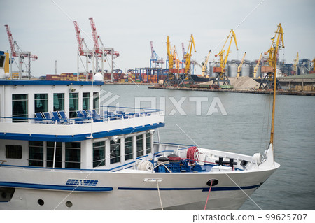 photo of a seaport, passenger ships is moored photo of a seaport, passenger ships is moored 99625707