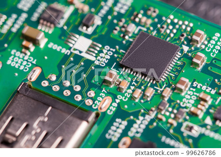 Close up of electronic components on the motherboard, microprocessor chip 99626786