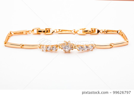 jewelry gold bracelet with precious stones isolated on white background . jewelry gold bracelet with precious stones isolated on white background . 99626797