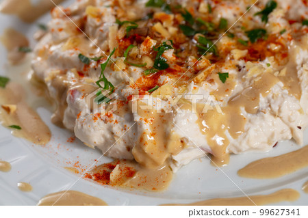 Traditional Turkish cuisine, Appetizer, salad made with eggplant and yoghurt. local name, Mutebbel. High quality photo 99627341