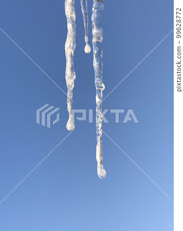 icicles on a blue background icicles on a blue background 99628772
