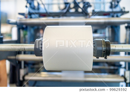 plastic roll in a factory for the production of plastic products 99629392