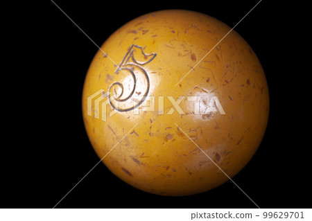 Old vintage billiard ball, number six. On black background 99629701