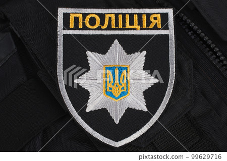 KYIV, UKRAINE - NOVEMBER 22, 2016. Badge of the National Police of Ukraine. KYIV, UKRAINE - NOVEMBER 22, 2016. Badge of the National Police of Ukraine. 99629716