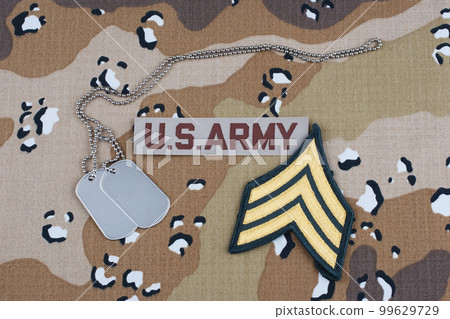 US ARMY sergeant rank patch and dog tags on Desert Battle Dress Uniform US ARMY sergeant rank patch and dog tags on Desert Battle Dress Uniform 99629729