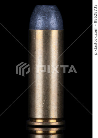 .45 caliber round isolated on black with reflexion. .45 caliber round isolated on black with reflexion. 99629735