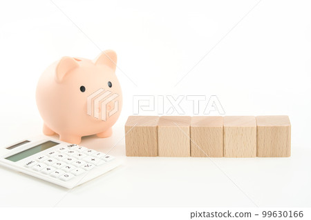 5 building blocks (no letters), a piggy bank and a calculator 5 building blocks (no letters), a piggy bank and a calculator 99630166