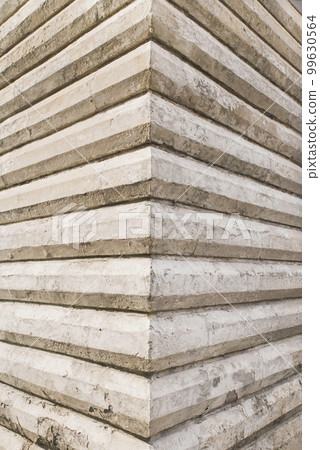 Background. corner of an old concrete building Background. corner of an old concrete building 99630564