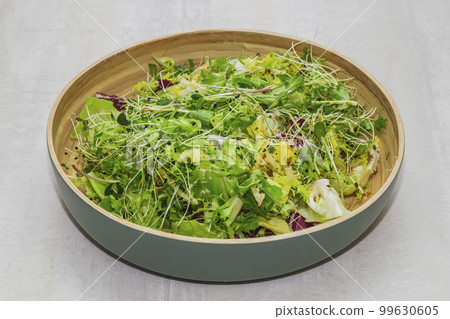 Salad with sprout of sunflower, flax and onion 99630605