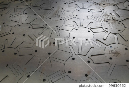 Steel sheet in which parts are laser cut Steel sheet in which parts are laser cut 99630662