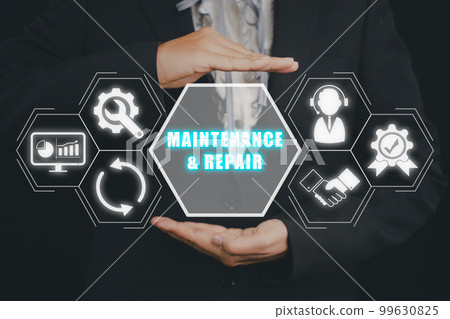 Maintenance and repair concept, Business person hand holding Maintenance and repair icon on virtuals screen. 99630825