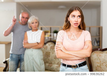 Daughter-in-law is offended by her husband and mother-in-law. Domestic quarrel 99636262