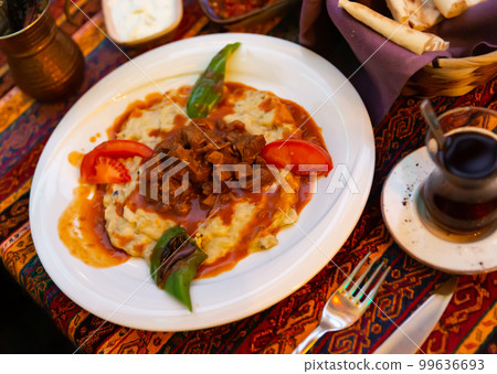 Hunkar begendi made with eggplant and meat Hunkar begendi made with eggplant and meat 99636693