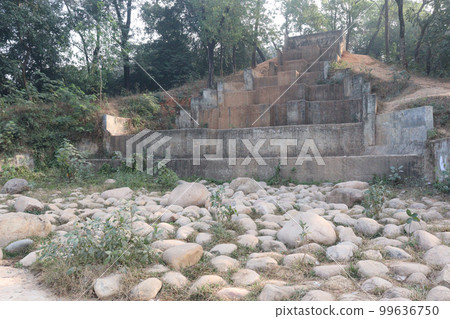 Man-made waterfall stairs on park Man-made waterfall stairs on park 99636750