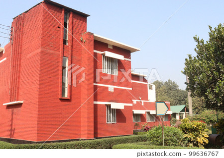 red colored resort building on park 99636767