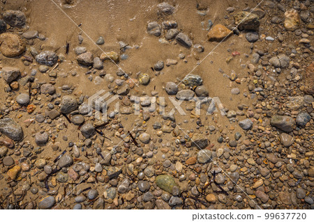 Rocky shapes on the beach. textures and patterns generated on the stones of the Ibiza. Rocky shapes on the beach. textures and patterns generated on the stones of the Ibiza. 99637720