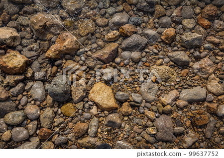 Rocky shapes on the beach. textures and patterns generated on the stones of the Ibiza. 99637752