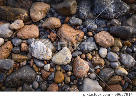 Rocky shapes on the beach. textures and patterns generated on the stones of the Ibiza. 99637914