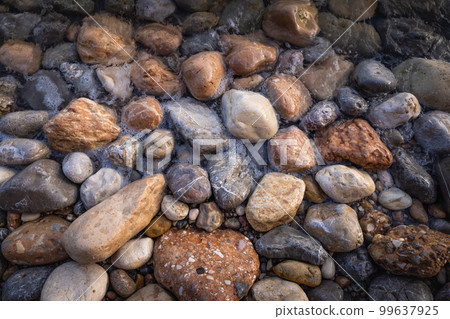 Rocky shapes on the beach. textures and patterns generated on the stones of the Ibiza. Rocky shapes on the beach. textures and patterns generated on the stones of the Ibiza. 99637925