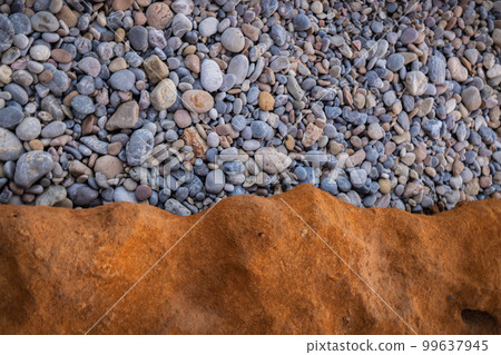 Rocky shapes on the beach. textures and patterns generated on the stones of the Ibiza. Rocky shapes on the beach. textures and patterns generated on the stones of the Ibiza. 99637945